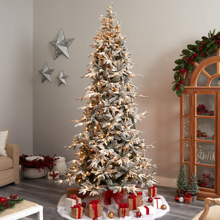 9.5’ Flocked Manchester Spruce Artificial Christmas Tree With 650 Lights And 1733 Bendable Branches