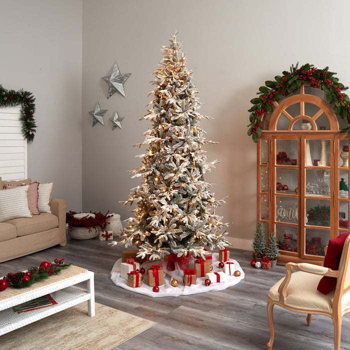 9.5’ Flocked Manchester Spruce Artificial Christmas Tree With 650 Lights And 1733 Bendable Branches